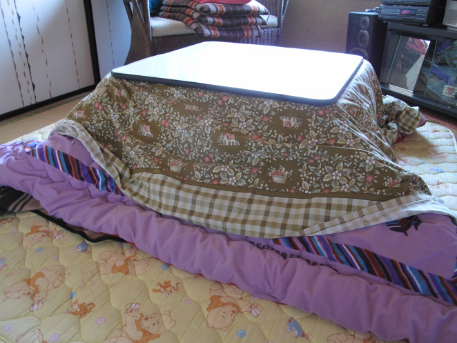 The kotatsu is a truly Japanese invention Basically it's a table that has